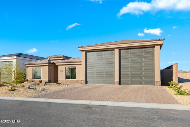 view of front of property with a garage