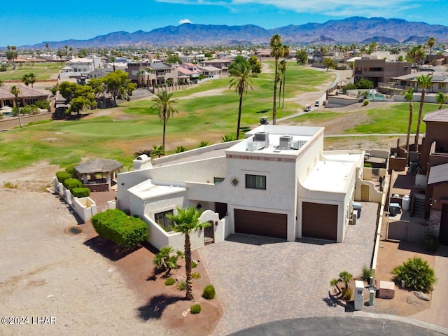 drone / aerial view featuring a mountain view