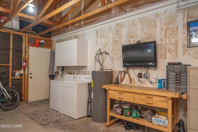 basement featuring separate washer and dryer and water heater