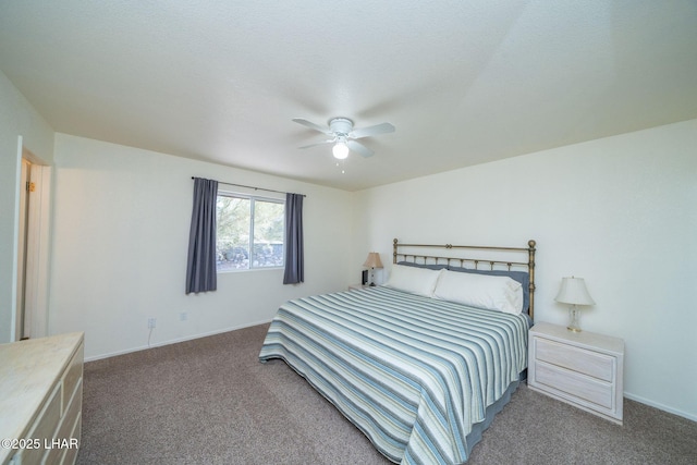 bedroom featuring baseboards, ceiling fan, and carpet floors