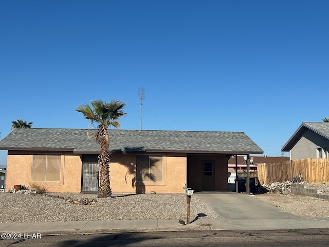 view of front facade featuring a carport