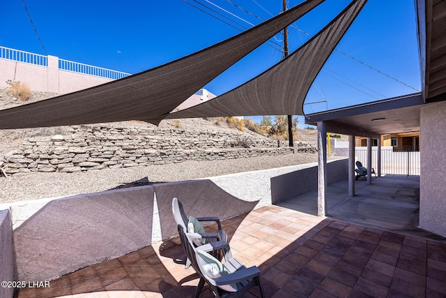 view of patio / terrace with fence