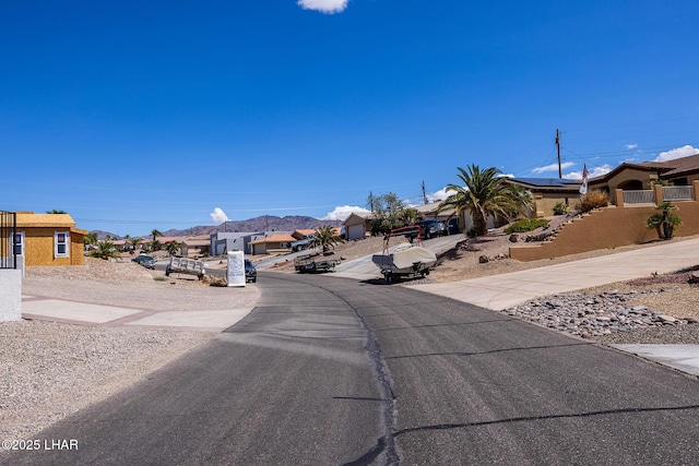 view of road with a residential view