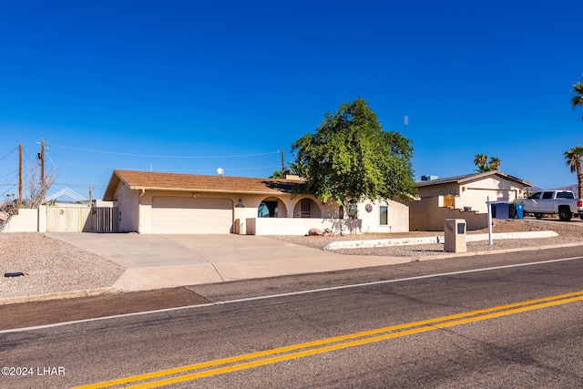 single story home featuring a garage