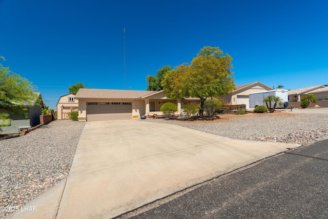 3841 Big Horn Dr, Lake Havasu City, AZ 86406 - ranch-style home with a garage, concrete driveway, and stucco siding