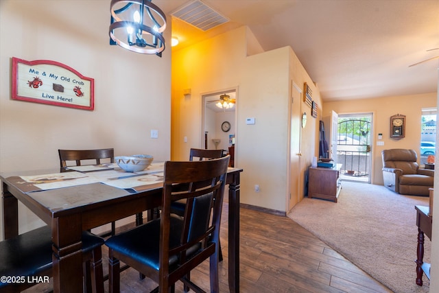 3841 Big Horn Dr, Lake Havasu City, AZ 86406 - dining room with ceiling fan and dark wood-style flooring