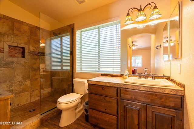 3841 Big Horn Dr, Lake Havasu City, AZ 86406 - bathroom featuring vanity, tiled shower, and ceiling fan