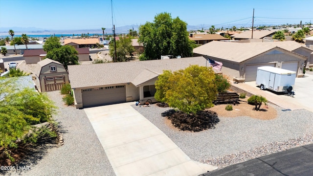3841 Big Horn Dr, Lake Havasu City, AZ 86406 - single story home featuring a residential view, driveway, stucco siding, and a garage