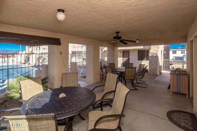 view of patio with ceiling fan