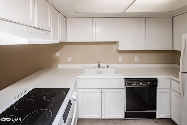 kitchen with white cabinetry, white appliances, sink, and light tile patterned floors