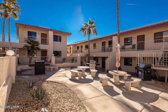 view of home's community featuring a patio