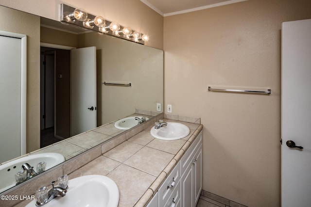 bathroom featuring vanity and crown molding