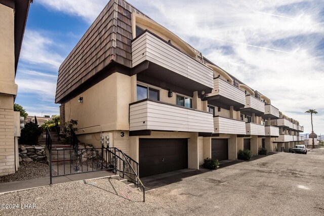 view of building exterior with a garage