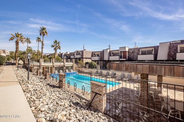 view of pool featuring a patio area