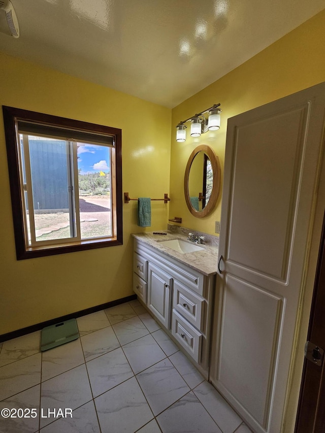 bathroom with visible vents, marble finish floor, vanity, and baseboards