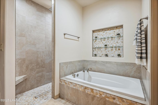 full bath featuring a garden tub and a walk in shower