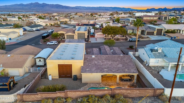 aerial view with a mountain view and a residential view