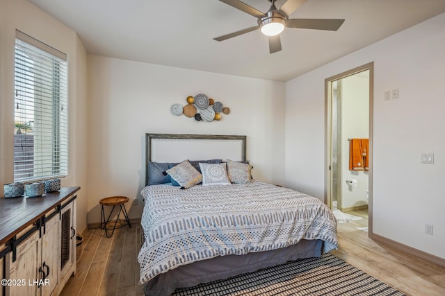 bedroom with light wood finished floors, ceiling fan, and baseboards