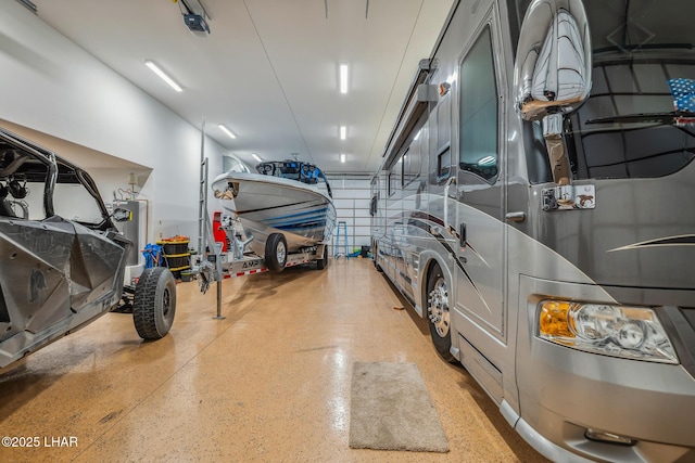 garage featuring water heater