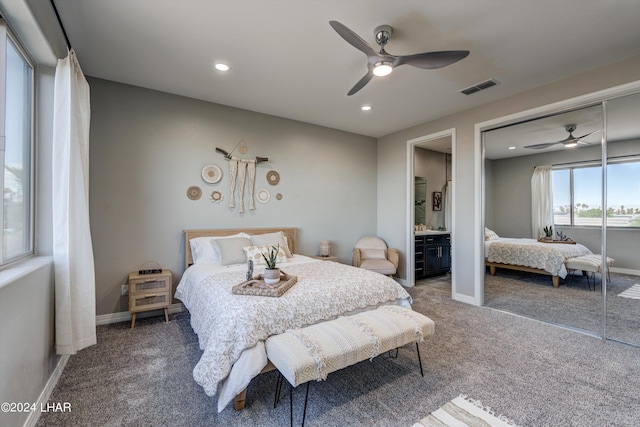 bedroom featuring visible vents, ceiling fan, and carpet floors