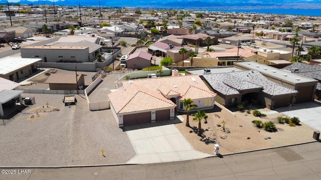 birds eye view of property featuring a residential view and a mountain view