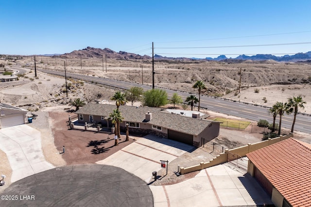 881 Bryce Ct, Lake Havasu City, AZ 86406 - view of subject property with a mountain backdrop and a desert landscape
