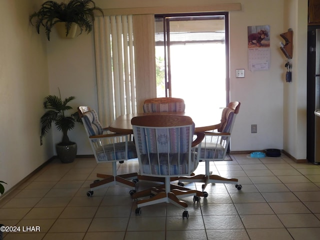 view of tiled dining space