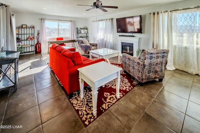 610 Roamer Ln, Lake Havasu City, AZ 86403 - tiled living area with a glass covered fireplace, recessed lighting, and ceiling fan