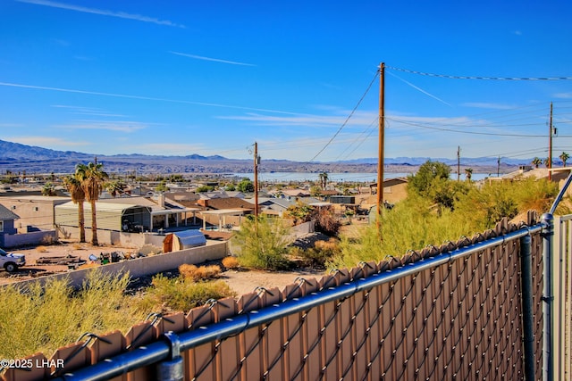 610 Roamer Ln, Lake Havasu City, AZ 86403 - view of yard featuring a residential view, a mountain view, and fence