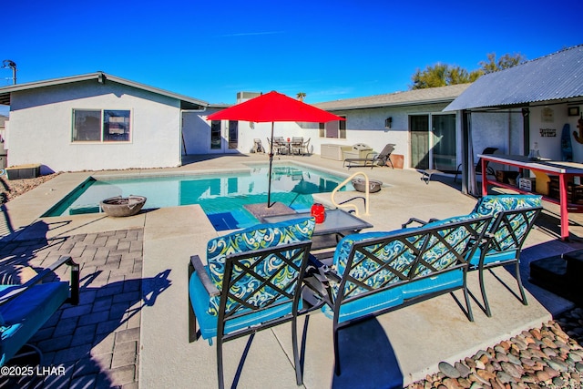 610 Roamer Ln, Lake Havasu City, AZ 86403 - view of pool with a patio, a fenced in pool, and a fire pit
