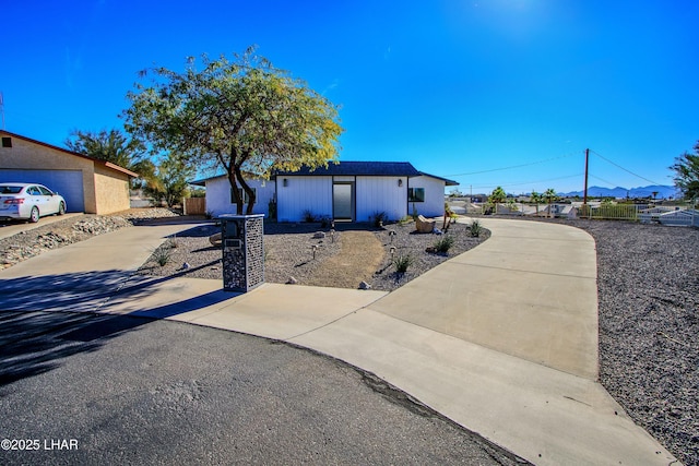 610 Roamer Ln, Lake Havasu City, AZ 86403 - view of front of house with concrete driveway and fence