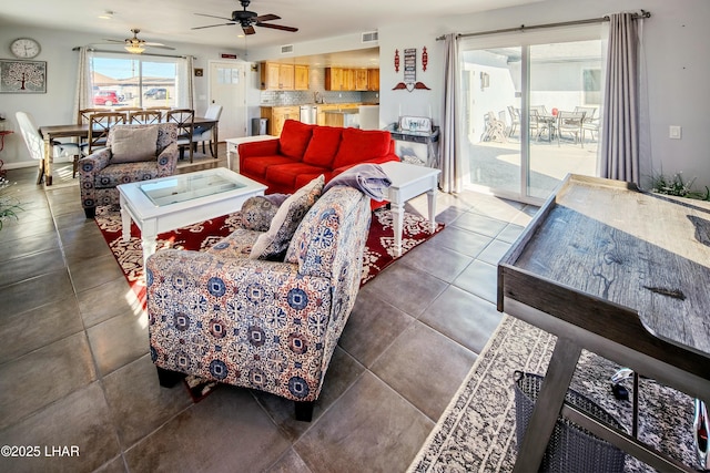 610 Roamer Ln, Lake Havasu City, AZ 86403 - living room with tile patterned flooring, visible vents, and a ceiling fan