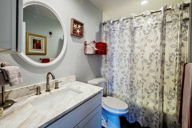 610 Roamer Ln, Lake Havasu City, AZ 86403 - full bath with a shower with shower curtain, toilet, vanity, and a textured wall
