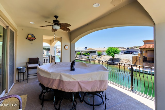 8652 Hopi Dr, Parker, AZ 85344 - patio / terrace featuring ceiling fan, a grill, and a residential view