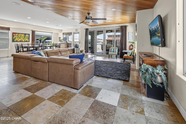 8652 Hopi Dr, Parker, AZ 85344 - living room featuring wooden ceiling, recessed lighting, ceiling fan, and stone tile flooring