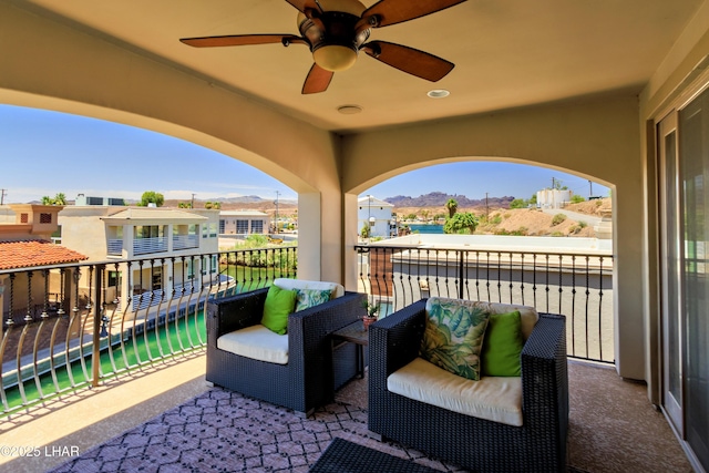 8652 Hopi Dr, Parker, AZ 85344 - patio / terrace featuring a ceiling fan and a mountain view