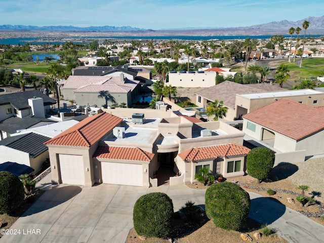 bird's eye view featuring a mountain view and a residential view