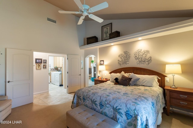 bedroom with arched walkways, high vaulted ceiling, visible vents, and light colored carpet