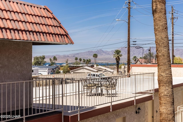 2301 Mcculloch Blvd N Unit E, Lake Havasu City, AZ 86403 - view of patio with a balcony and a mountain view