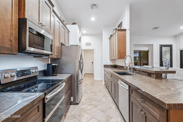 kitchen with stainless steel appliances and sink