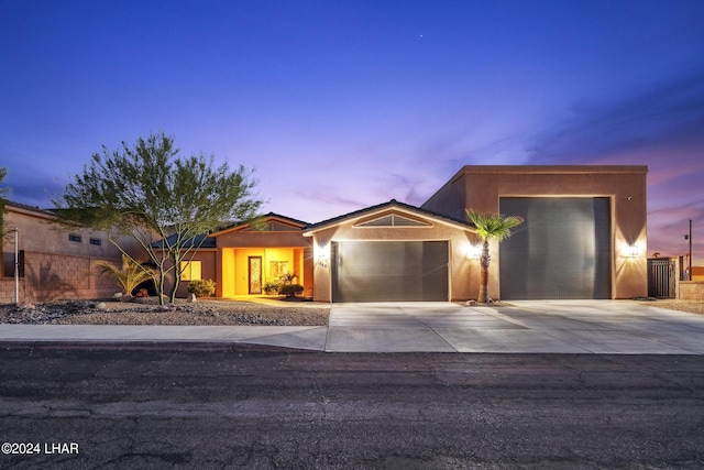 view of front of home with a garage