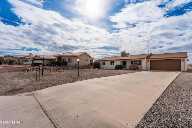 single story home featuring a garage