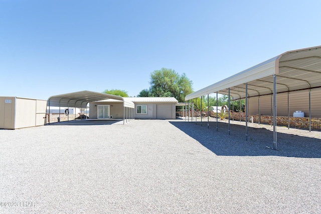 exterior space with a carport