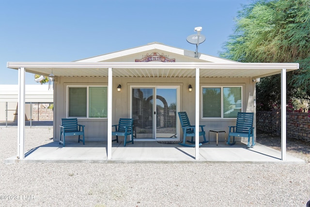 rear view of house featuring a patio area