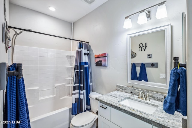 2950 N Kiowa Blvd Unit B102, Lake Havasu City, AZ 86404 - bathroom featuring toilet, shower / bath combo with shower curtain, and vanity