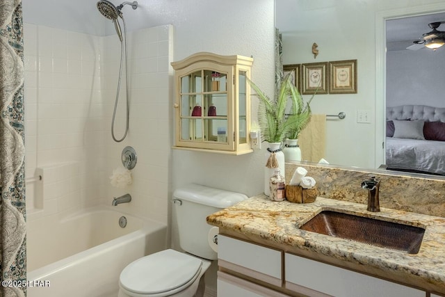 ensuite bathroom featuring shower / bathtub combination with curtain, toilet, ensuite bathroom, ceiling fan, and vanity