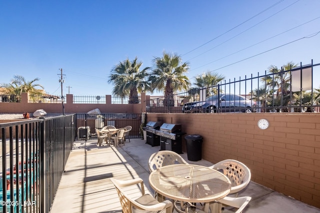 view of patio with a grill