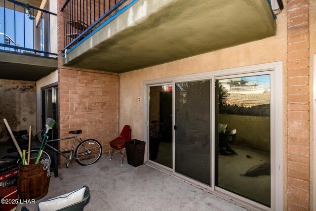 view of patio / terrace with a balcony