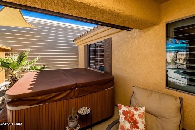 2641 Palo Verde Blvd N, Lake Havasu City, AZ 86404 - exterior space with stucco siding and a hot tub