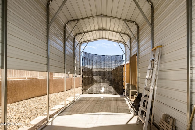 2641 Palo Verde Blvd N, Lake Havasu City, AZ 86404 - view of parking / parking lot with fence, a mountain view, and a detached carport
